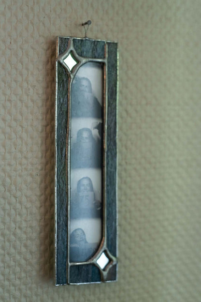 Decorative picture frame on a beige textured background